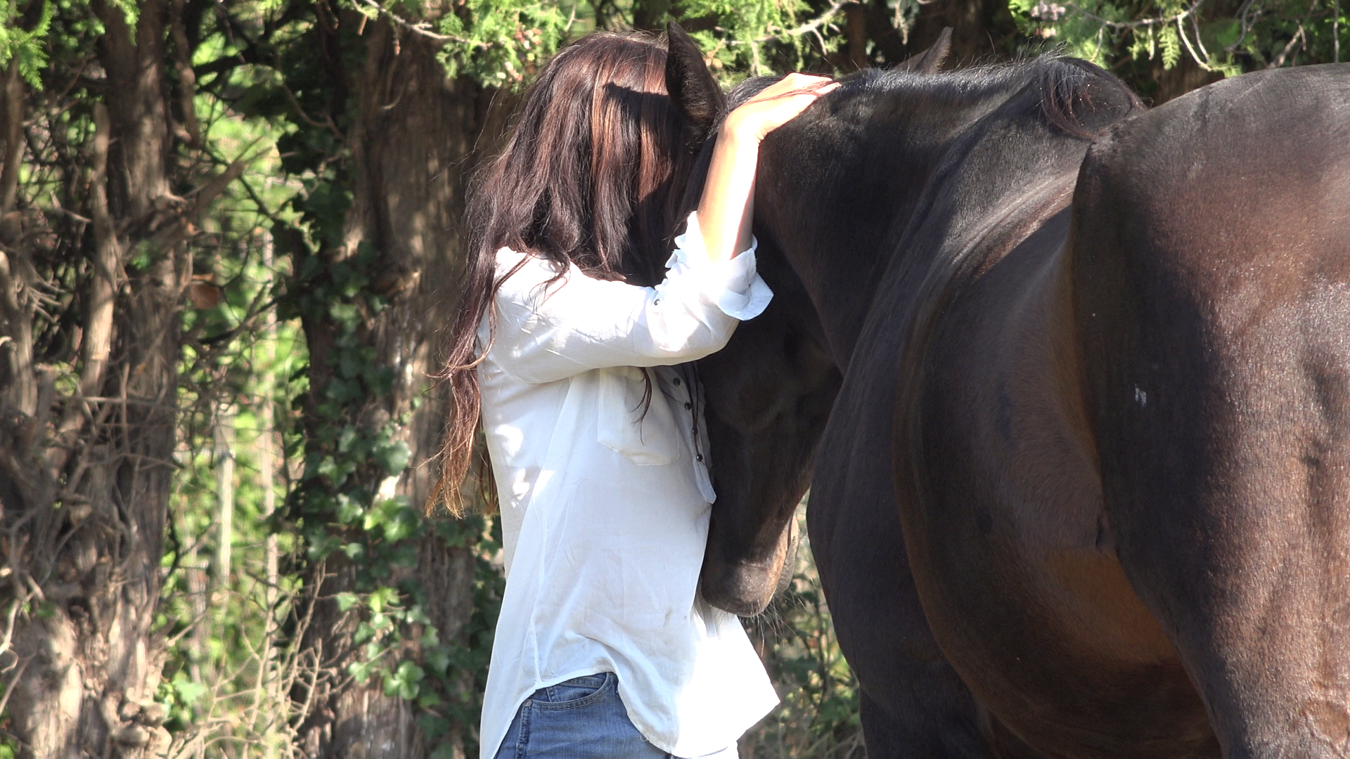 Elodie en communion avec son cheval Lulu